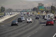 Cars driving on open freeway