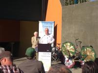 Man giving speech behind podium