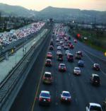 cars on a freeway at dusk