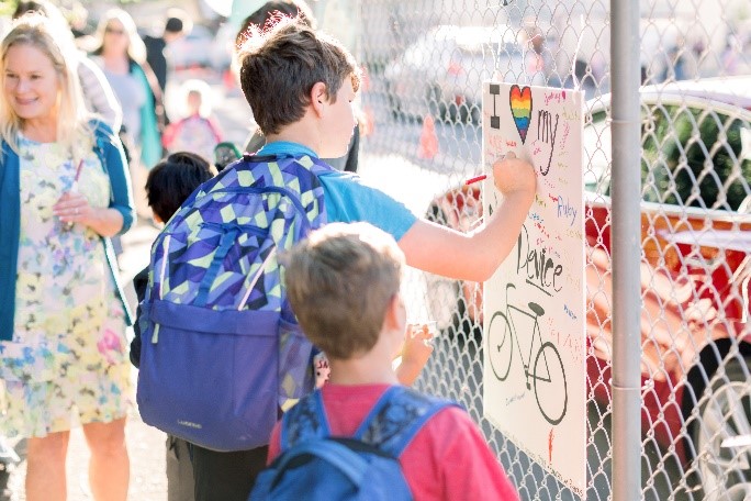 Children celebrating International Walk and Roll to School Day